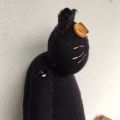 czarny kot maskotka
