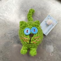 zielony kot magnes na lodówkę